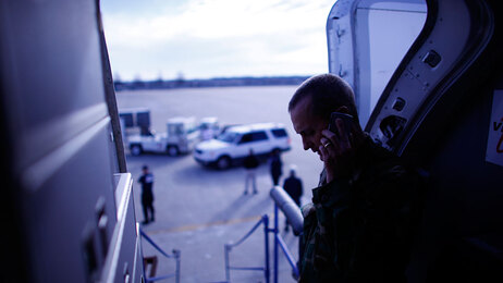 HHS Regional Emergency Coordinator Tom Bowman makes a last call before takeoff in Atlanta.