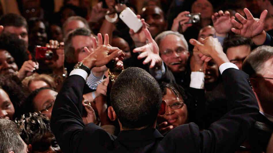 President Obama works the crowd at a Washington fundraiser where he defended health overhaul. President Obama works the crowd at a Washington fundraiser where he defended health overhaul.
