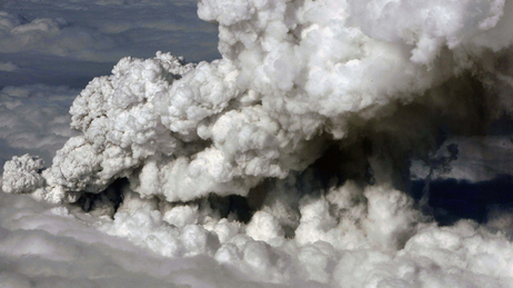 Smoke and steam rises from the volcano under the Eyjafjallajokull glacier in Iceland.