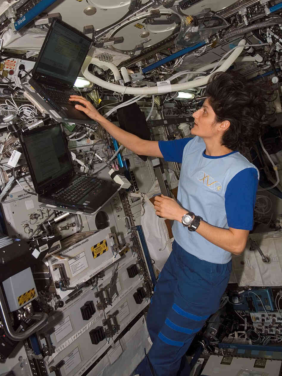 Astronaut Sunita Williams wears a black activity monitor on her left wrist during a mission on the I Astronaut Sunita Williams wears a black activity monitor on her left wrist during a mission on the I