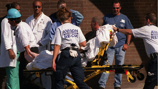 An injured firefighter is brought into the emergency room at St. Vincent's Hospital in Manhattan, Se