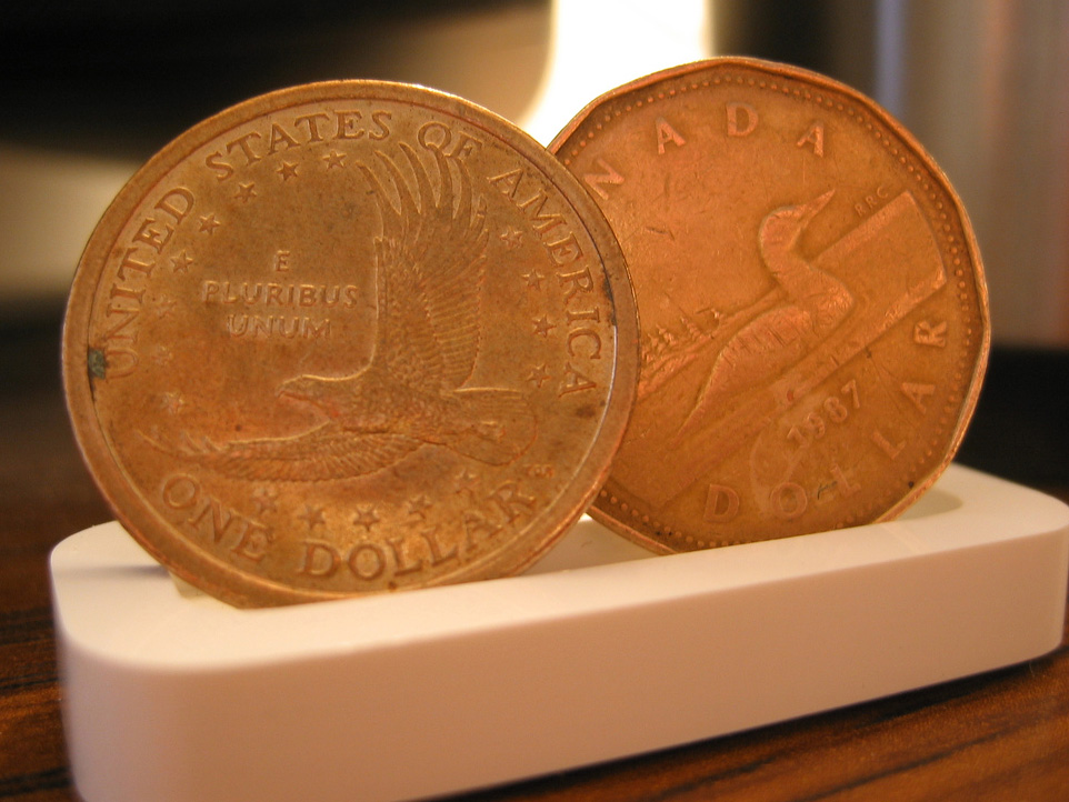 The Loonie and the U.S. $1 Coin