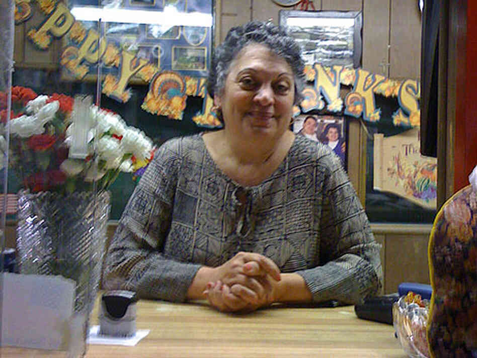 A woman in her office at the Hunts Point Market A woman in her office at the Hunts Point Market