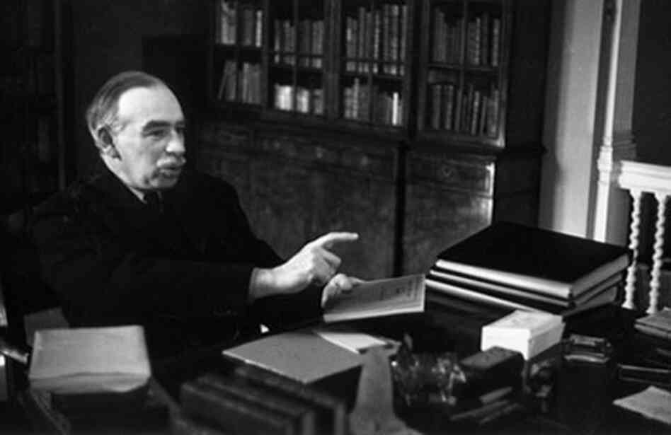 John Maynard Keynes at his desk. John Maynard Keynes at his desk.