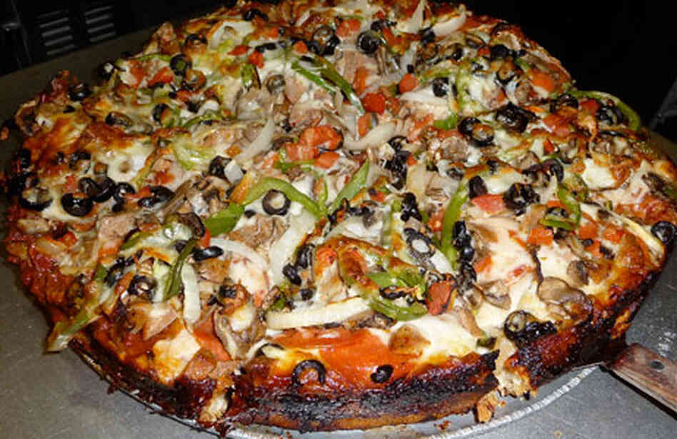 A deep dish pizza A deep dish pizza