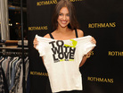 A model shows off the the CFDA's Fashion for Haiti t-shirt. A model shows off the the CFDA's Fashion for Haiti t-shirt.