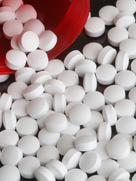 Pile of pills. Lynette Watanabe/iStockphoto