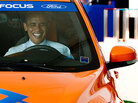 U.S. President Barack Obama sits in an electric Ford Focus U.S. President Barack Obama sits in an electric Ford Focus
