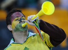 A Ghana supporter blows a vuvuzela. A Ghana supporter blows a vuvuzela.