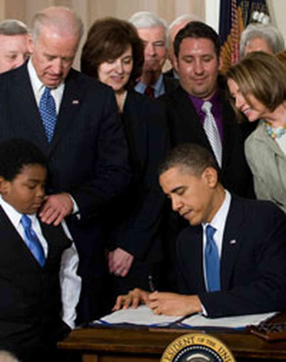President Barack Obama signs the healthcare insurance reform legislation President Barack Obama signs the healthcare insurance reform legislation