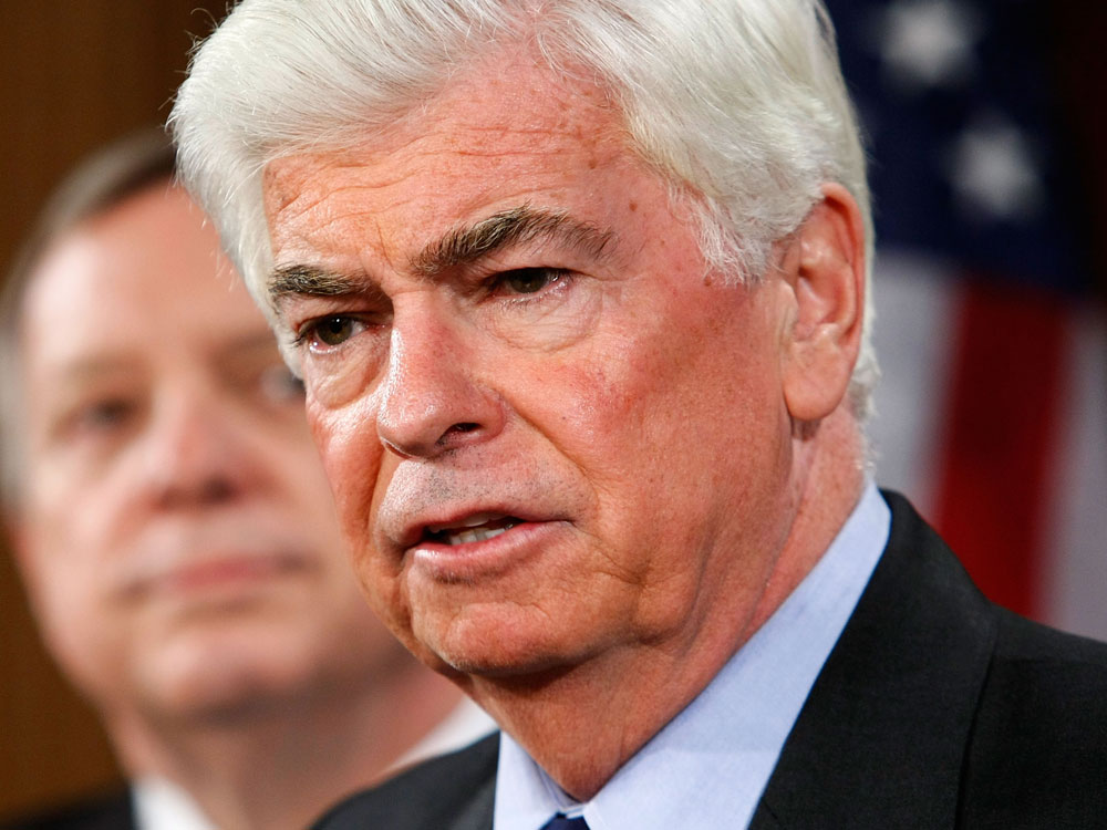 Sen. Christopher Dodd (D-CT) (R) speaks as Senate Democratic Whip Sen. Richard Durbin (D-IL) (L) listens during a news conference on Capitol Hill June 11, 2009 in Washington, DC. (Photo by Alex Wong/Getty Images)