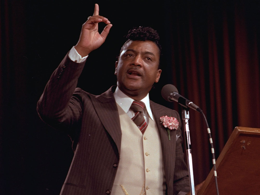 Evangelist Reverend Ike, also known as Frederick J. Eikerenkoetter, delivers a sermon, Sept. 17, 1977. (AP Photo)