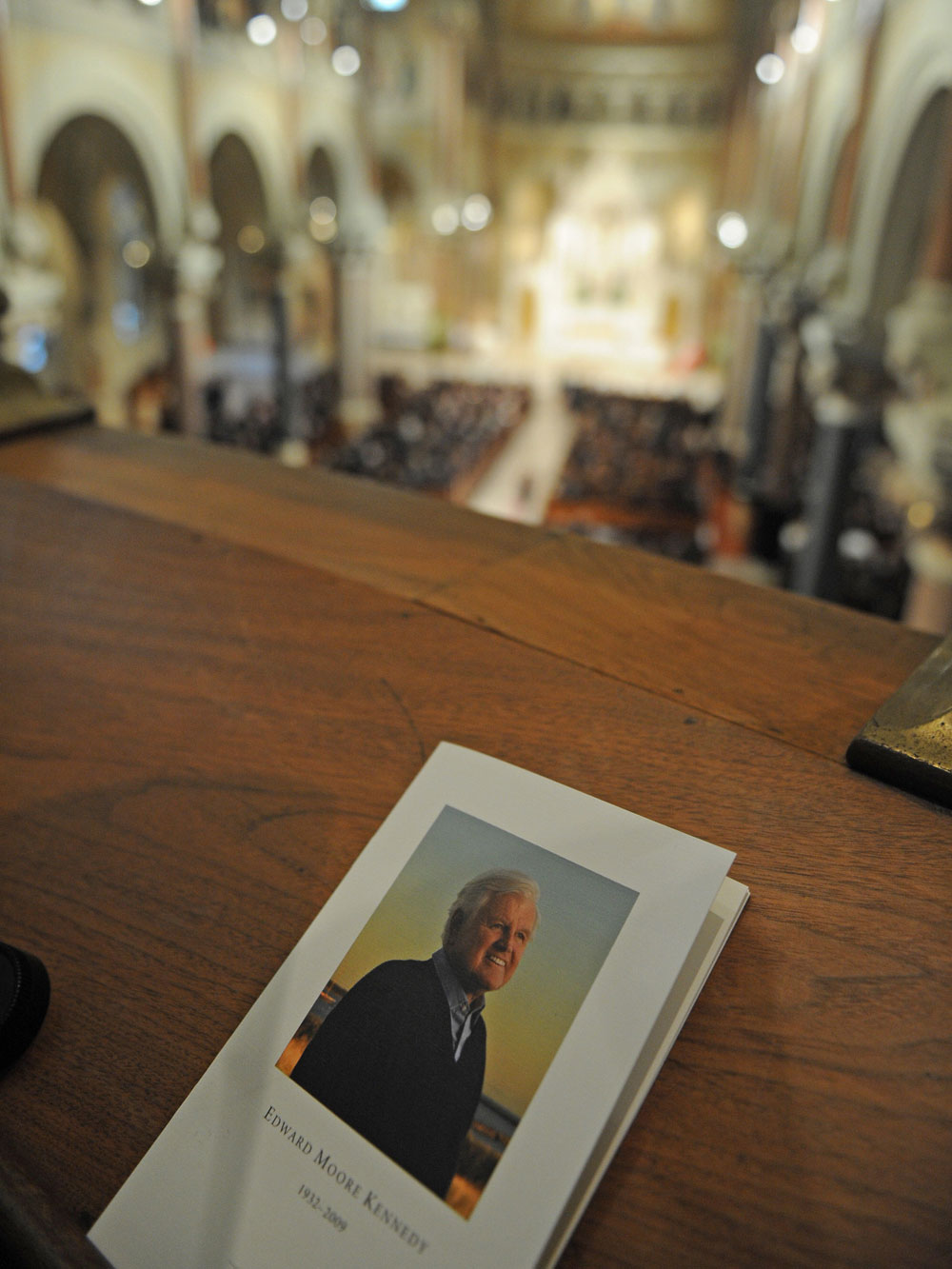 A program for the funeral of Sen. Edward Kennedy is seen in Our Lady of Perpetual Help Basilica during his funeral mass in the Mission Hill neighborhood of Boston on August 29, 2009. (Jewel Samad/AFP/Getty Images)