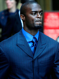 Plaxico Burress leaves Manhattan criminal court in New York, Thursday, Aug. 20, 2009. (AP Photo/Seth Wenig)