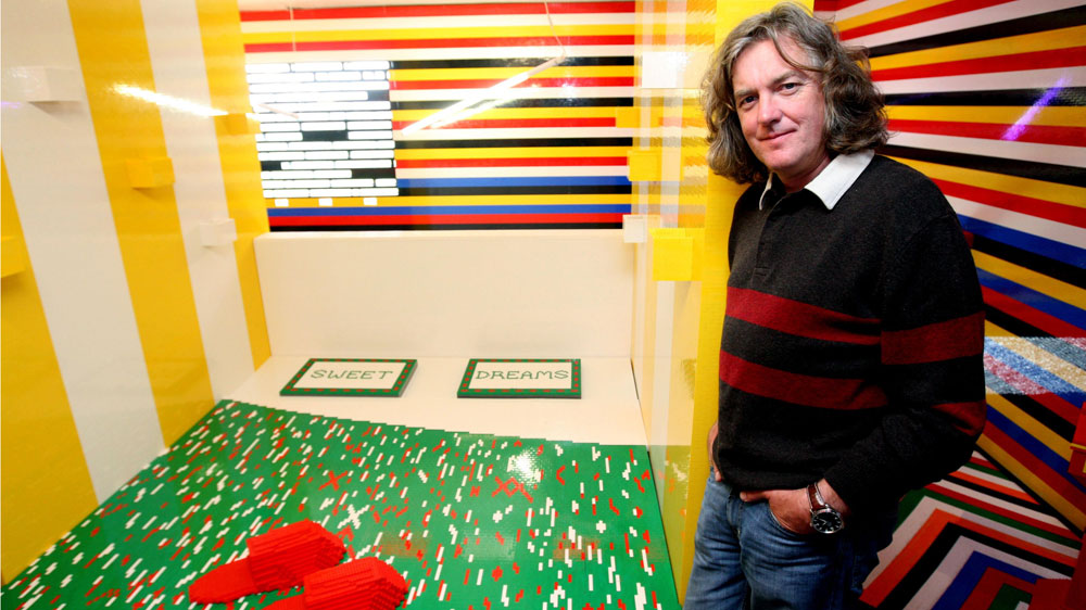 TV presenter James May visits a full size house made entirely with Lego bricks, Friday Sept. 18, 2009. The house at Denbies Wine Estate in Dorking, England, was made in conjunction with a television programme. (AP Photo/PA, Steve Parsons)