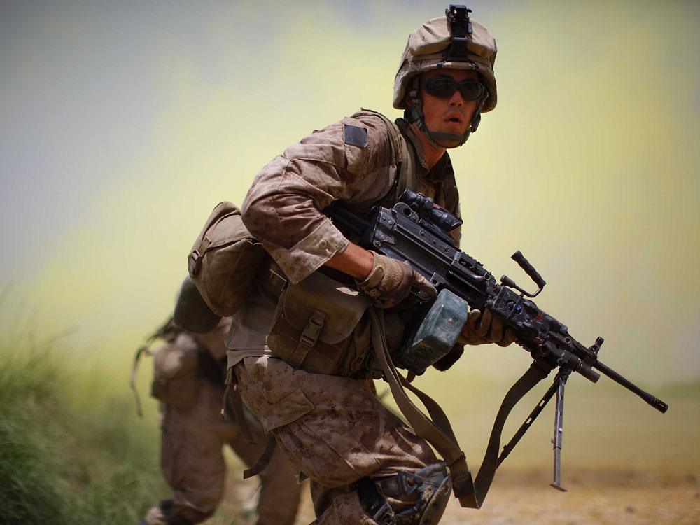 MIAN POSHTEH, AFGHANISTAN- JULY 8:   U.S. Marines from 2nd Marine Expeditionary Brigade, RCT 2nd Battalion 8th Marines Golf Co. engages in a fire fight on July 8, 2009 in Mian Poshteh, Afghanistan . (Photo by David Gilkey/NPR)