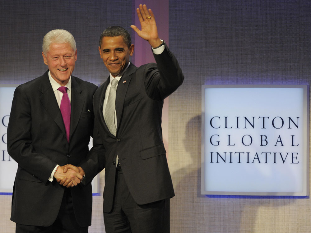  President Barack Obama and former president Bill Clinton shake hands during the Fifth Annual Meeting of the Cinton Global Initative (CGI) in New York on September 22, 2009.          (Timothy A. Clary/AFP/Getty Images)