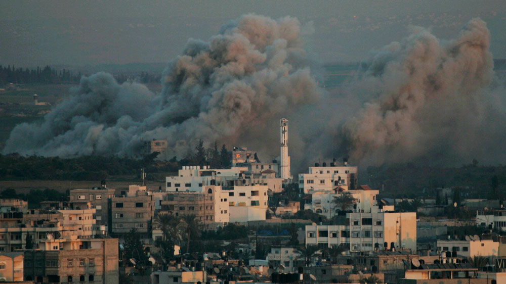 FILE - In this Tuesday, Jan. 13, 2009 file photo, smoke rises following explosions caused by Israeli military operations in Gaza City. (AP Photo/Hatem Moussa, File)