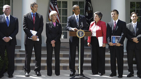 Obama with cabinet officials at White House event on swine flu prep.
