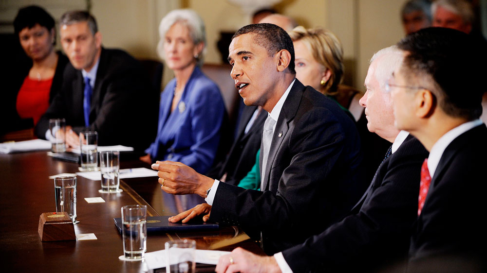WASHINGTON - SEPTEMBER 10: President Barack Obama speaks as Health and Human Services Secretary Kathleen Sebelius (3rd-L), Secretary of State Hillary Clinton (4th-L) Secretary of Defense Robert Gates (2nd-R) look on as he meets with members of the Cabinet in the Cabinet Room of the White House on September 10, 2009 in Washington, DC. Obama spoke to reporters following the meeting, while accepting the apology of Rep. Joe Wilson's (R-SC) outburst yesterday at the joint session of Congress. (Photo by Olivier Douliery-Pool/Getty Images)