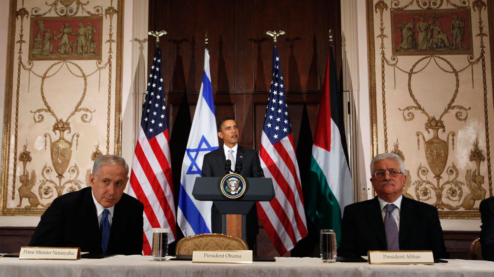 President Barack Obama makes a statement before the start of his trilateral meeting with Israeli Prime Minister Benjamin Netanyahu, left, and Palestinian President Mahmoud Abbas in New York, Tuesday, Sept. 22, 2009. (AP Photo/Charles Dharapak)