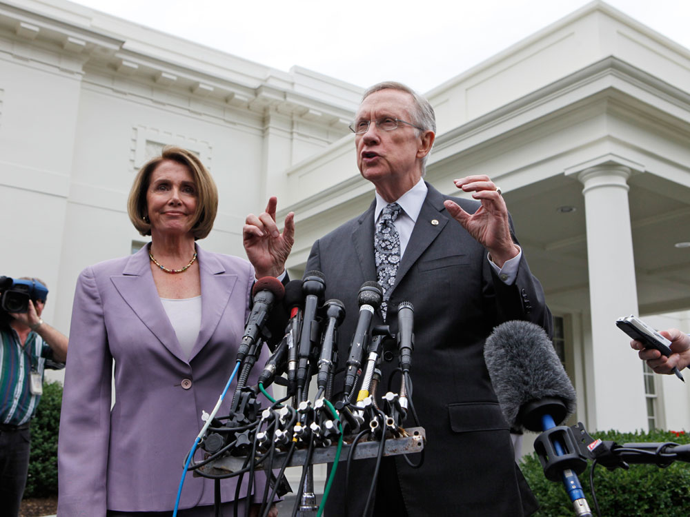 Sen Majority Leader Harry Reid and House Speaker Nancy Pelosi outside the White House Tuesday.