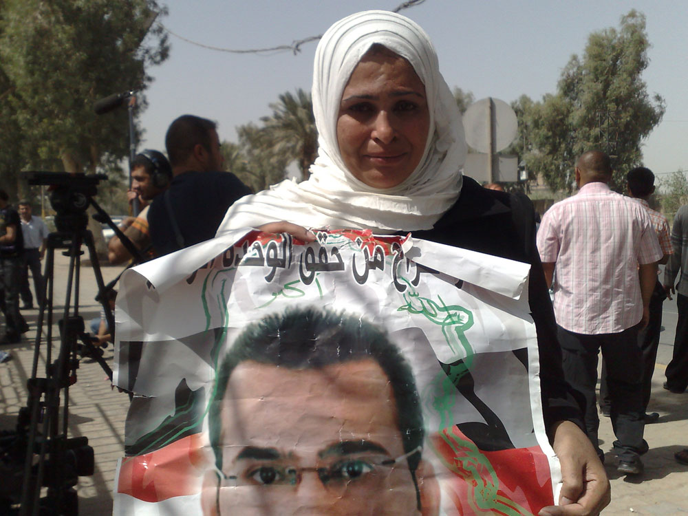 Muthadhar al-Zeidi's sister Rabab, awaits his release. Ghassan Adnan/NPR