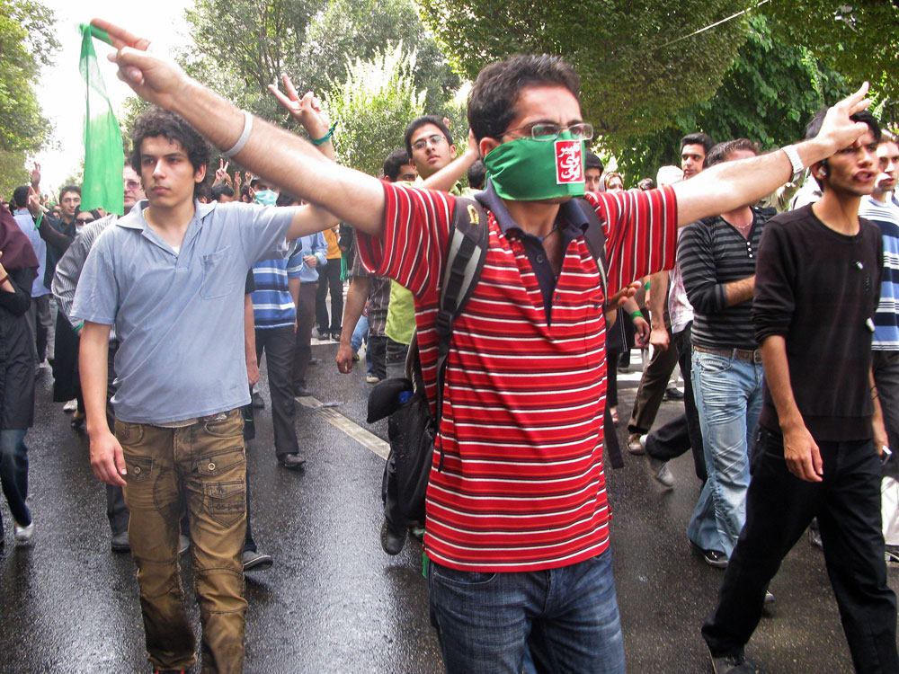 Iranian opposition supporters, wearing green accessories, take part in the Quds (Jerusalem) Day rally in Tehran on September 18, 2009. Opposition supporters chanted 