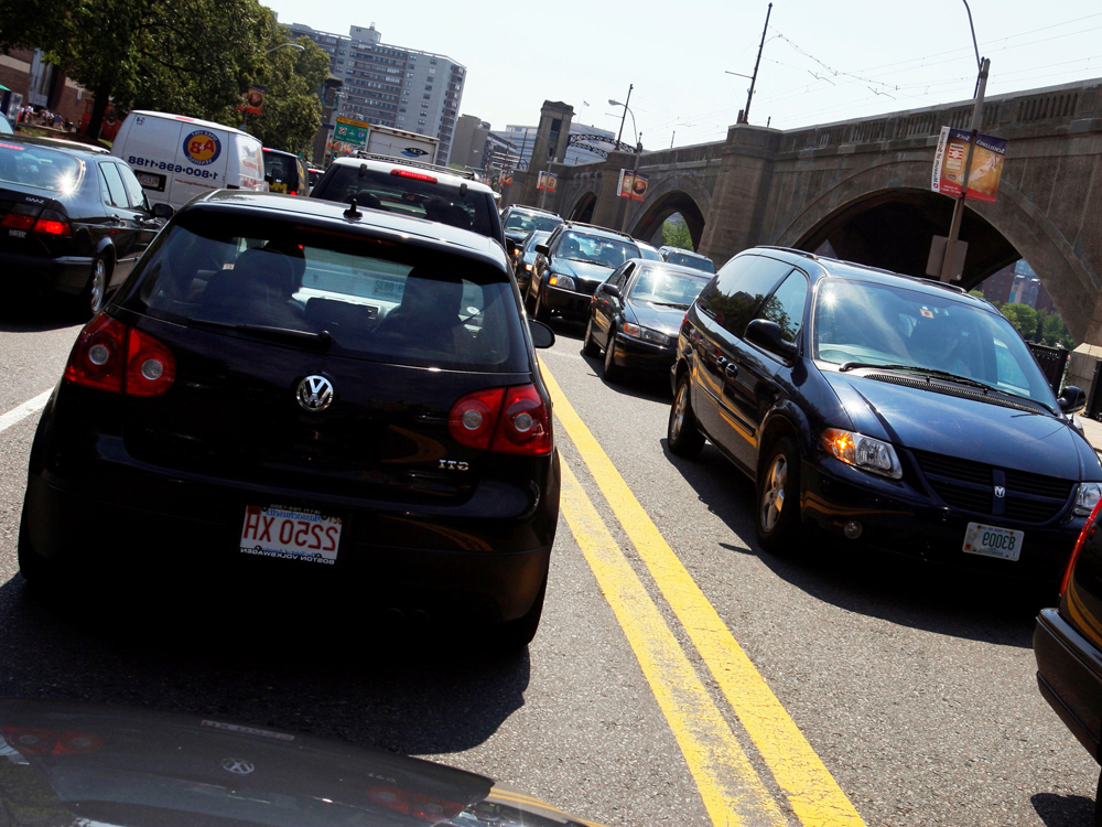 Traffic builds heading to and from downtown Boston Thursday, July 3, 2008. (AP Photo/Elise Amendola)