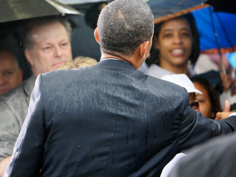 President Obama in the rain from behind.