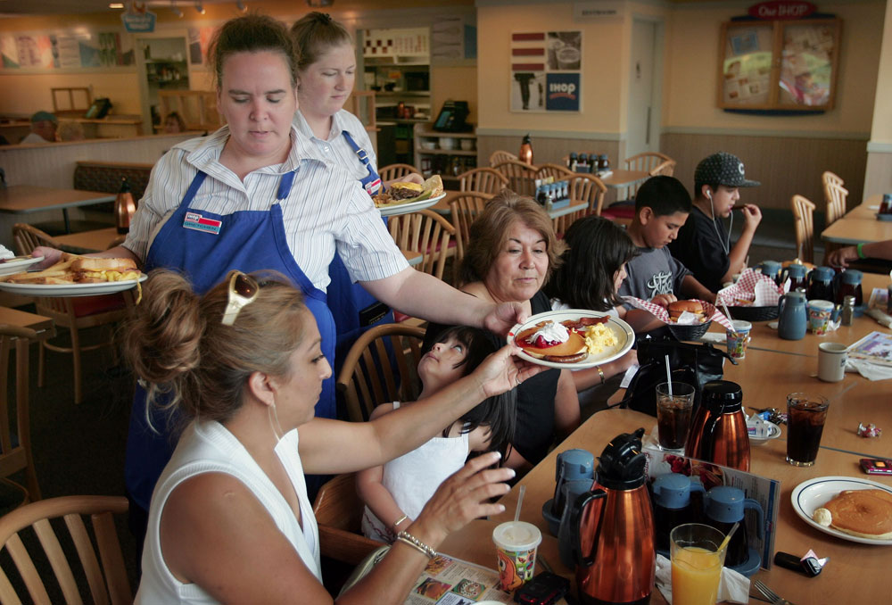 Customers are served at IHOP.