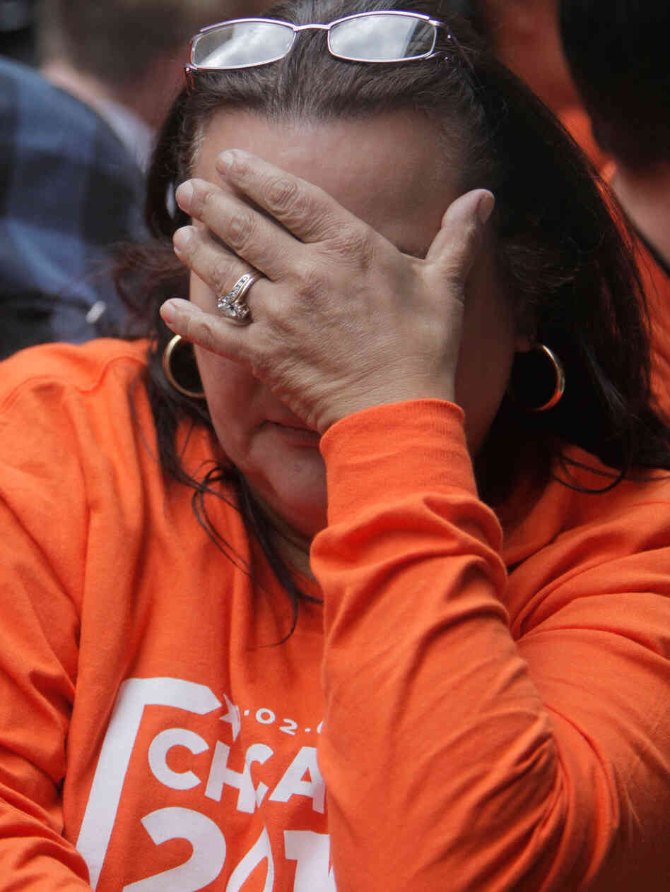 A Chicago 2016 supporter reacts after the announcement from the 121st International Olympic Committe A Chicago 2016 supporter reacts after the announcement from the 121st International Olympic Committe