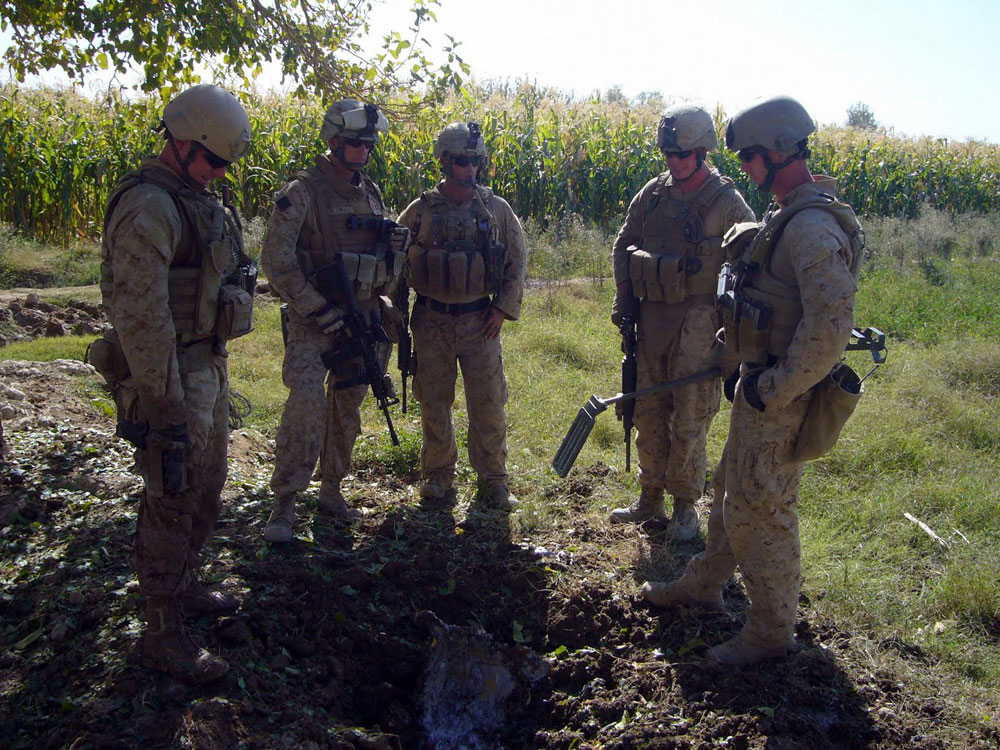 Marines gather around the deadly silver goo. Graham Smith/NPR