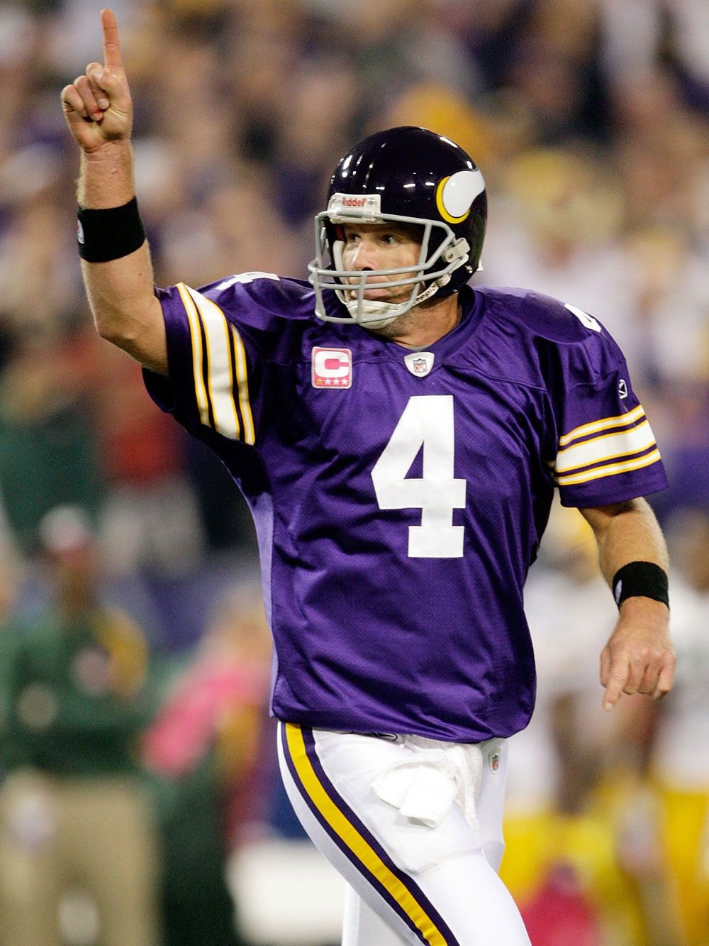 Quarterback Brett Favre #4 of the Minnesota Vikings celebrates after a touchdown during the game against the Green Bay Packers on October 5, 2009 at Hubert H. Humphrey Metrodome in Minneapolis, Minnesota. (Photo by Jamie Squire/Getty Images) 
