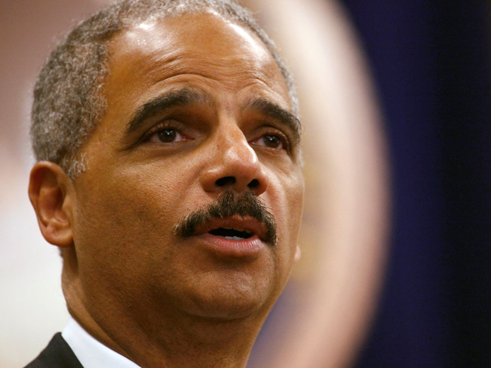 Attorney General Eric Holder addresses employees at the Justice Department in Washington, Thursday April 9, 2009. (AP Photo/J. David Ake)