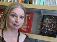 In this image taken on Thursday, Oct. 8, 2009 the winner of the 2009 Booker Prize for fiction, Hilary Mantel, is with her book <em>Wolf Hall</em> following an interview in London.(AP Photo/Alastair Grant)