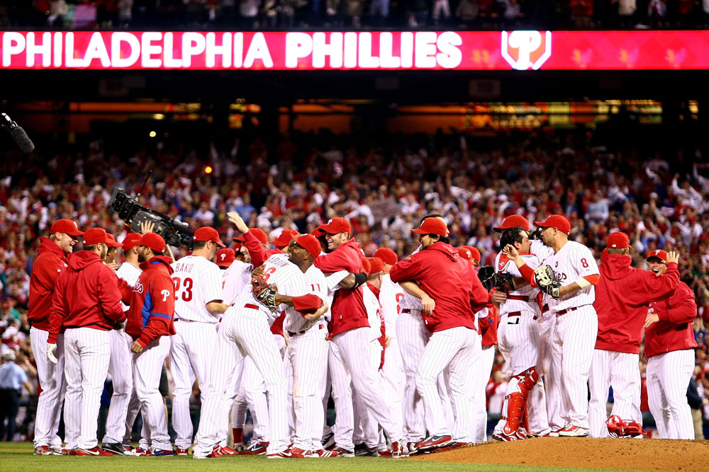 The Philadelphia Phillies celebrate defeating the Los Angeles Dodgers 10-4 to advance to the World Series in Game Five of the NLCS during the 2009 MLB Playoffs at Citizens Bank Park on October 21, 2009 in Philadelphia, Pa. (Photo by Chris McGrath/Getty Images)
