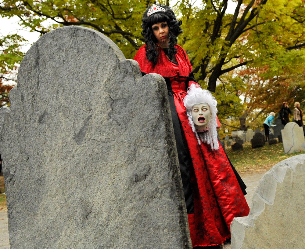 Woman in graveyard.