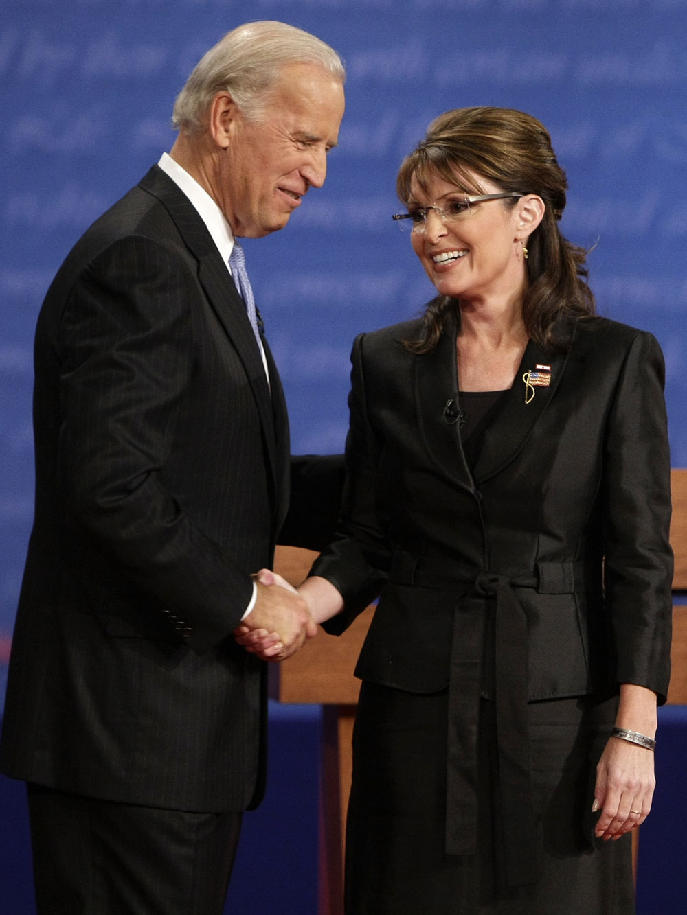 Democratic vice presidential candidate Sen. Joe Biden, D-Del., left, and Republican vice presidential candidate Alaska Gov. Sarah Palin shake hands before the start of a vice presidential debate at Washington University in St. Louis, Mo., Thursday, Oct. 2, 2008. (AP Photo/J. Scott Applewhite)