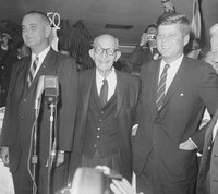 U.S. Sen. Carl Hayden (center) of Arizona wears a big grin as he poses with President John Kennedy and Vice President Lyndon Johnson, left, at one of the functions in Phoenix on Nov. 17, 1961 honoring the 84-year-old senator. (AP Photo/Harold Filan)
