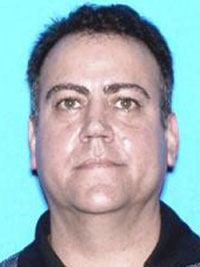 Jason Rodriguez is seen in this undated photo provided by the Orlando Police Department Friday Nov. 6, 2009. Rodriguez is considered the suspect in the shooting at an Orlando Office Building Friday. (AP Photo/Orlando Police Dept.)