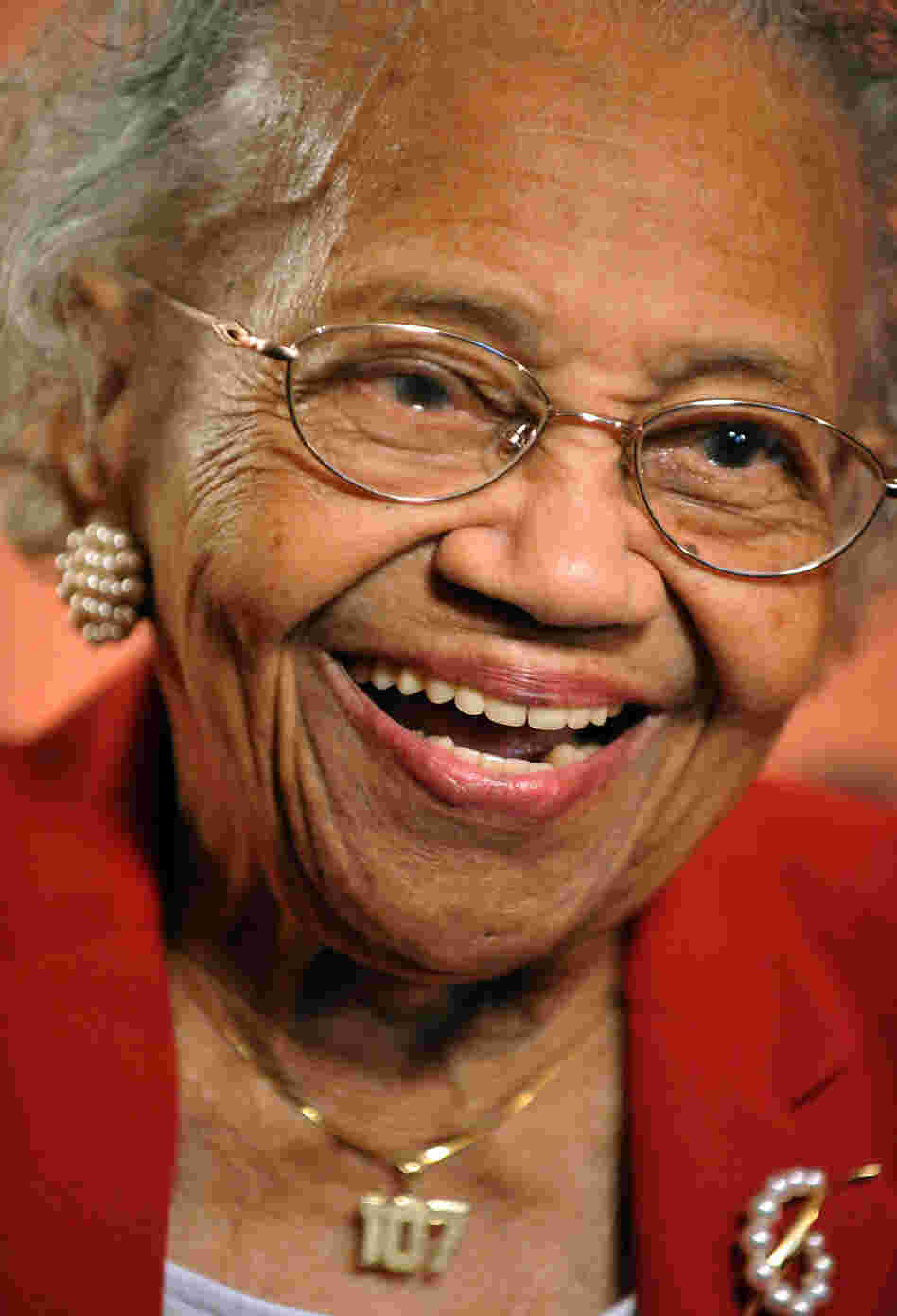 In a Sunday, Jan. 11, 2009 file photo, Ann Nixon Cooper celebrates her 107th birthday party at her h