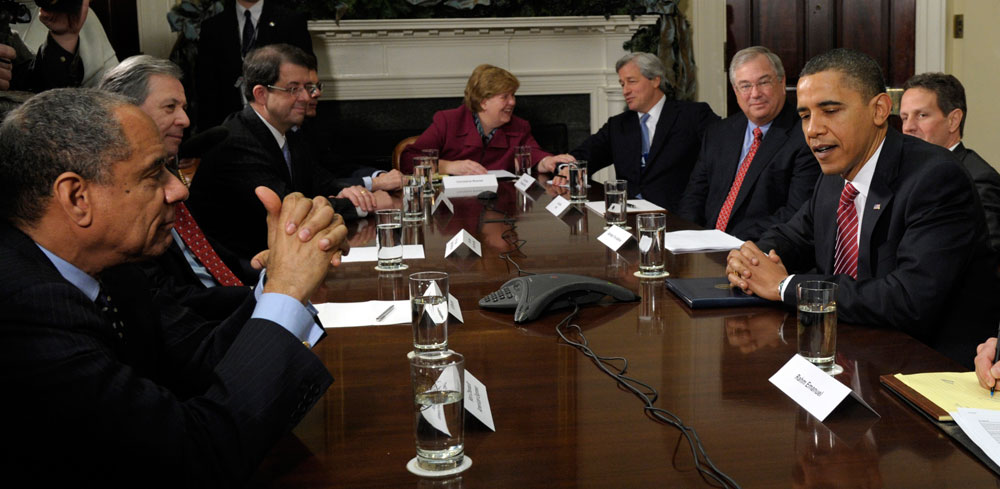 President Barack Obama meets with members of the financial industry in the Roosevelt Room of the White House in Washington, Tuesday, Dec. 15, 2009, to discuss the economic recovery. Clockwise, from left are, American Express Chief Executive Officer Ken Chenault; Wells Fargo President and Chief Executive Officer John Stumpf; Bank of New York Mellon Chairman and Chief Executive Officer Bob Kelly; Council of Economic Advisers Chair Christina Romer; JPMorgan Chase Chairman and Chief Executive Officer Jamie Dimon; PNC Chairman and Chief Executive Officer Jim Rohr; Treasury Secretary Timothy Geithner; and the president. (AP Photo/Susan Walsh)
