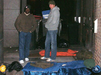 In this image made available by the charity Centrepoint in London, Tuesday Dec. 22, 2009, Britain's Prince William and Centrepoint CEO Seyi Obakin prepare for a night sleeping rough in freezing temperatures in central London, Tuesday Dec. 15, 2009. (AP Photo/Centrepoint/hand-out)