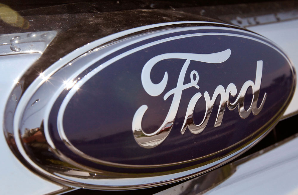 A Ford Fusion is offered for sale at a dealership August 3, 2009 in Downers Grove, Ill. (Photo by Scott Olson/Getty Images) 