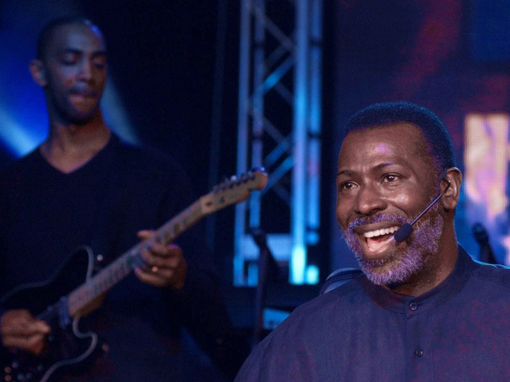 In an Aug. 1, 2000, file photo Teddy Pendergrass, right, performs at the Good Neighbor Community Outreach Celebration Tuesday, Aug. 1, 2000 in Philadelphia. Pendergrass, who became R&B's reigning sex symbol in the 1970s and '80s with his forceful, masculine voice and passionate love ballads died Wednesday, Jan. 13, 2010 at age 59. (AP Photo/Suzanne Plunkett/file)