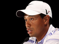 Tiger Woods speaks to the media at a press conference after round three of the 2009 Australian Masters at Kingston Heath Golf Club on November 14, 2009 in Melbourne, Australia. (Photo by Lucas Dawson/Getty Images)