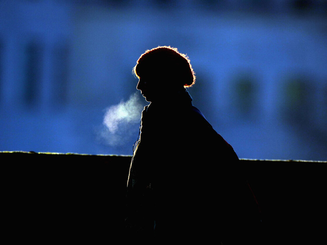 A woman walks to work in freezing conditions on January 4, 2010 in London, England. The Christmas pe