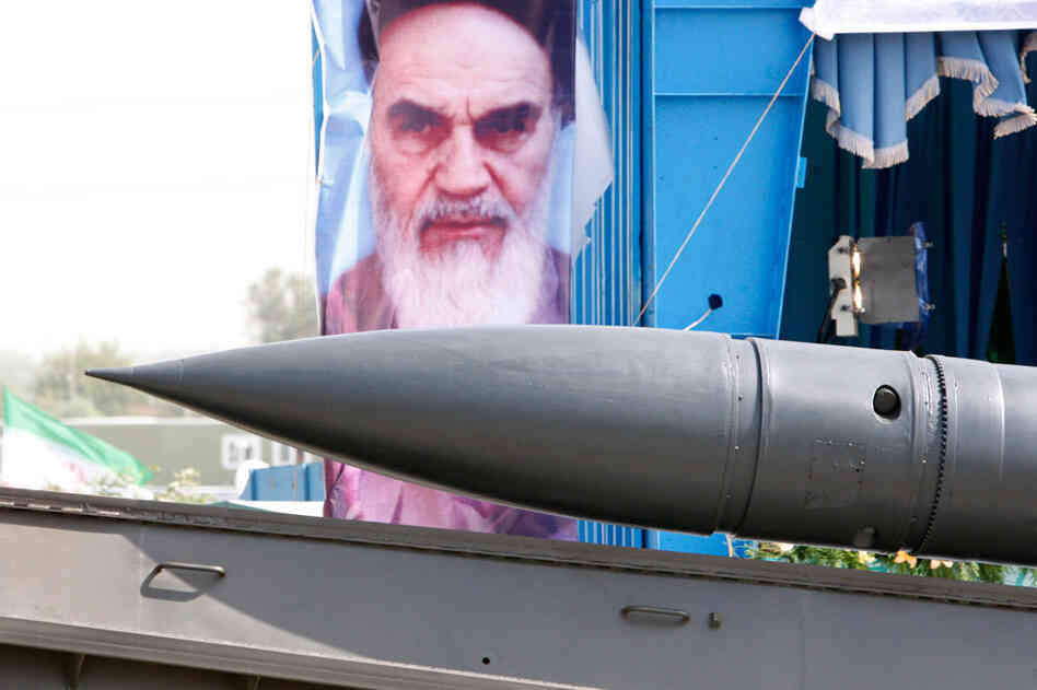 Iran rejected Secretary of State Hillary Clinton's charge that Iran is becoming a military dictators Iran rejected Secretary of State Hillary Clinton's charge that Iran is becoming a military dictators
