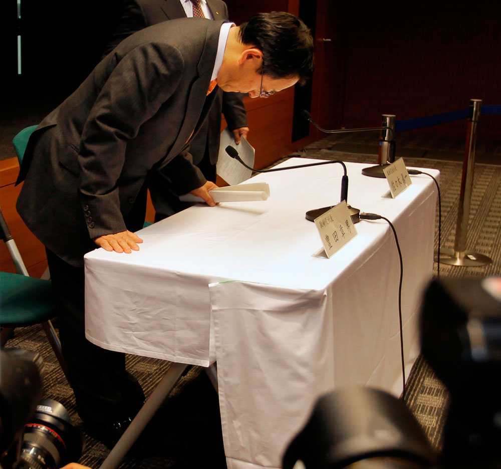 Toyota Motor Corp.'s President Akio Toyoda bows during a news conference at the Toyota headquarters in Nagoya, central Japan, Friday, Feb. 5, 2010. Toyoda apologized for the automaker's global recalls and promised to beef up quality control by setting up a special committee he would head himself. Toyoda said the automaker was still deciding what to do to fix braking problems with the popular Prius gas-electric hybrid. (AP Photo/Itsuo Inouye)